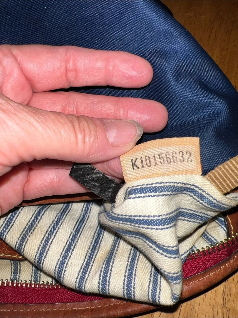 Dooney & Bourke Navy Nylon Messenger Bag with Brown Leather Trim and Red Accents